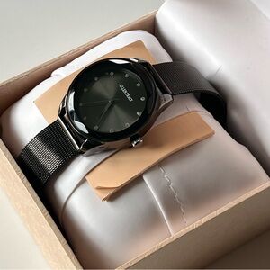 Ellen Tracy women’s quartz watch gunmetal face, metal/alloy/crystal in box